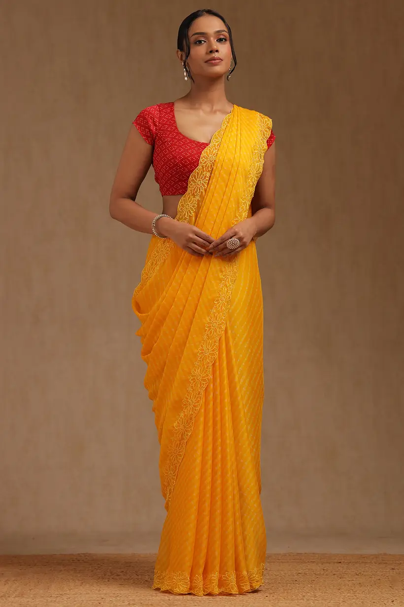 yellow georgette leheriya print saree with thread
